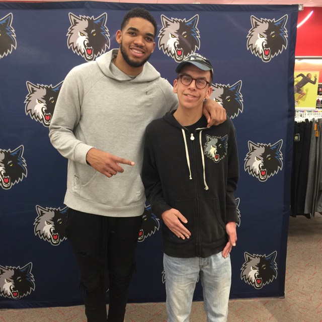 Peter Froehlich with Karl-Anthony Towns, a player for the Minnesota Timberwolves