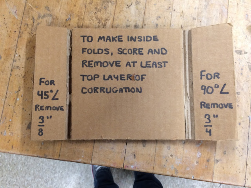 More directions for learners, including how to remove layers for making inside folds on a chair design