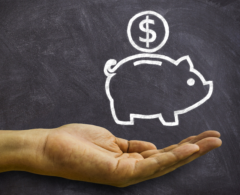 piggy bank on whiteboard