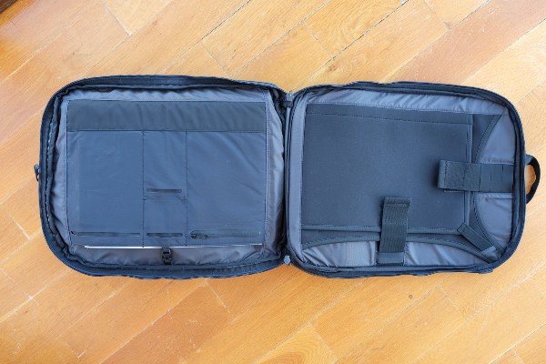 The laptop compartment can be opened flat as well. The left side is for storing documents and the right side is for storing your laptop & tablet.