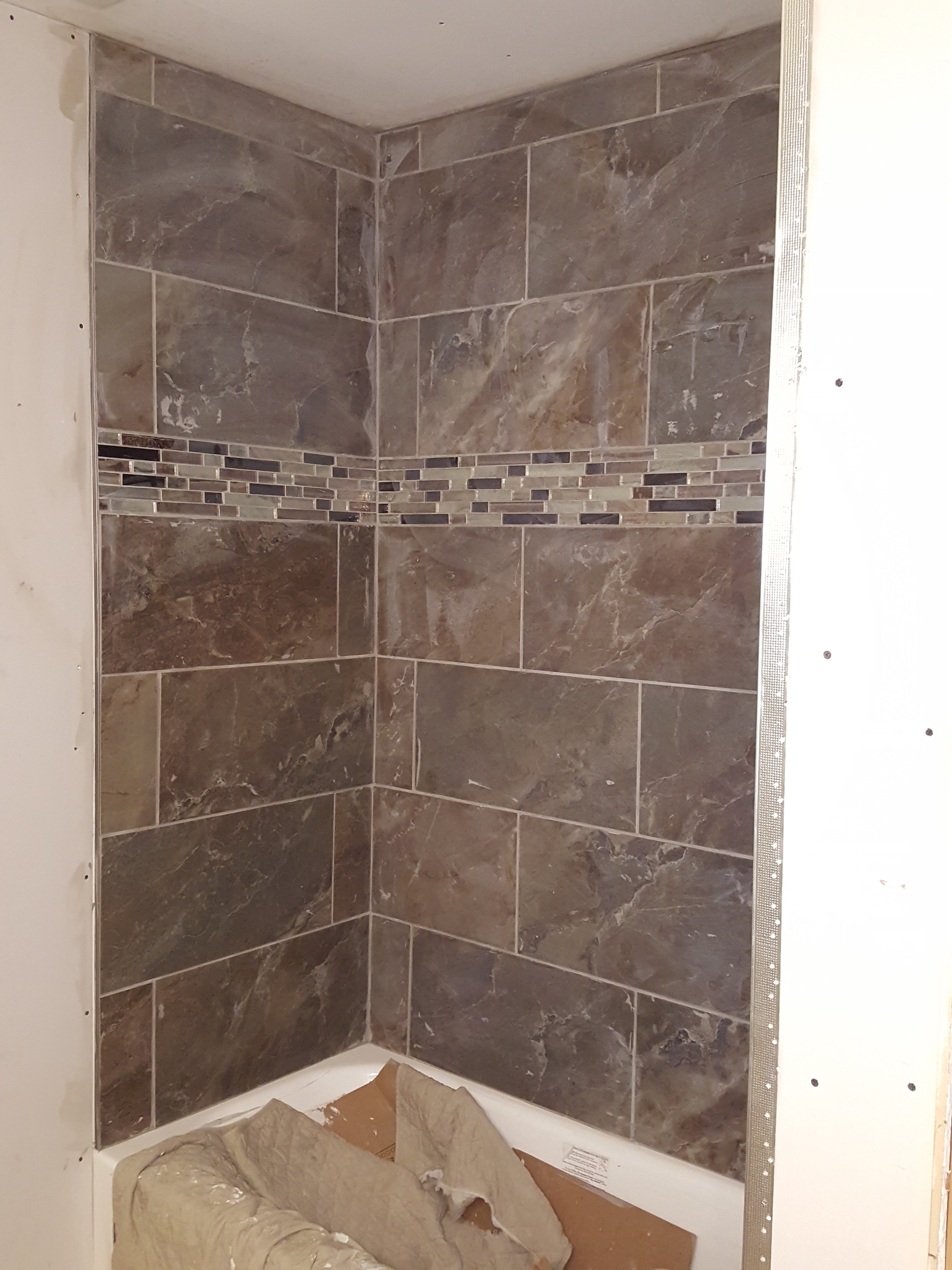 After picture of completed and furnished shower by Dream Concepts Contracting LLC.