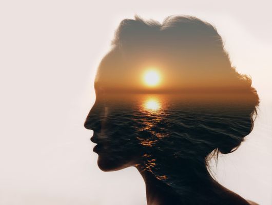 sunset in a woman's silhouette