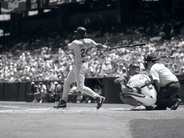 Centerfielder, Ken Griffey Jr. of the Seattle Mariners hitting a baseball