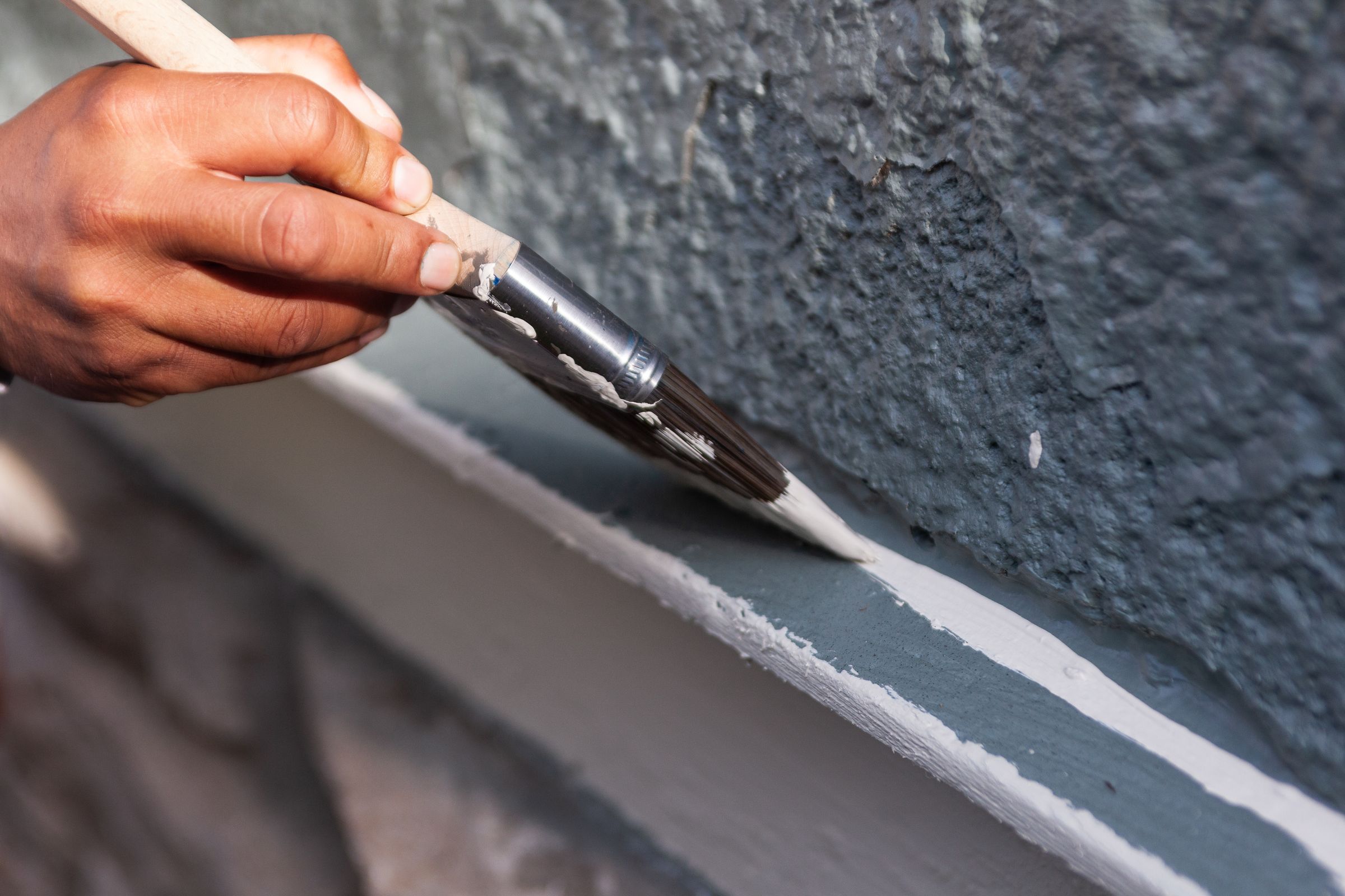 Painting exterior trim with a brush