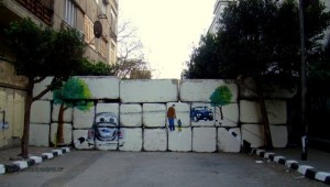 [In the right lighting, this mural on the wall of Yousef al-Guindy Street creates a visual mirage.]