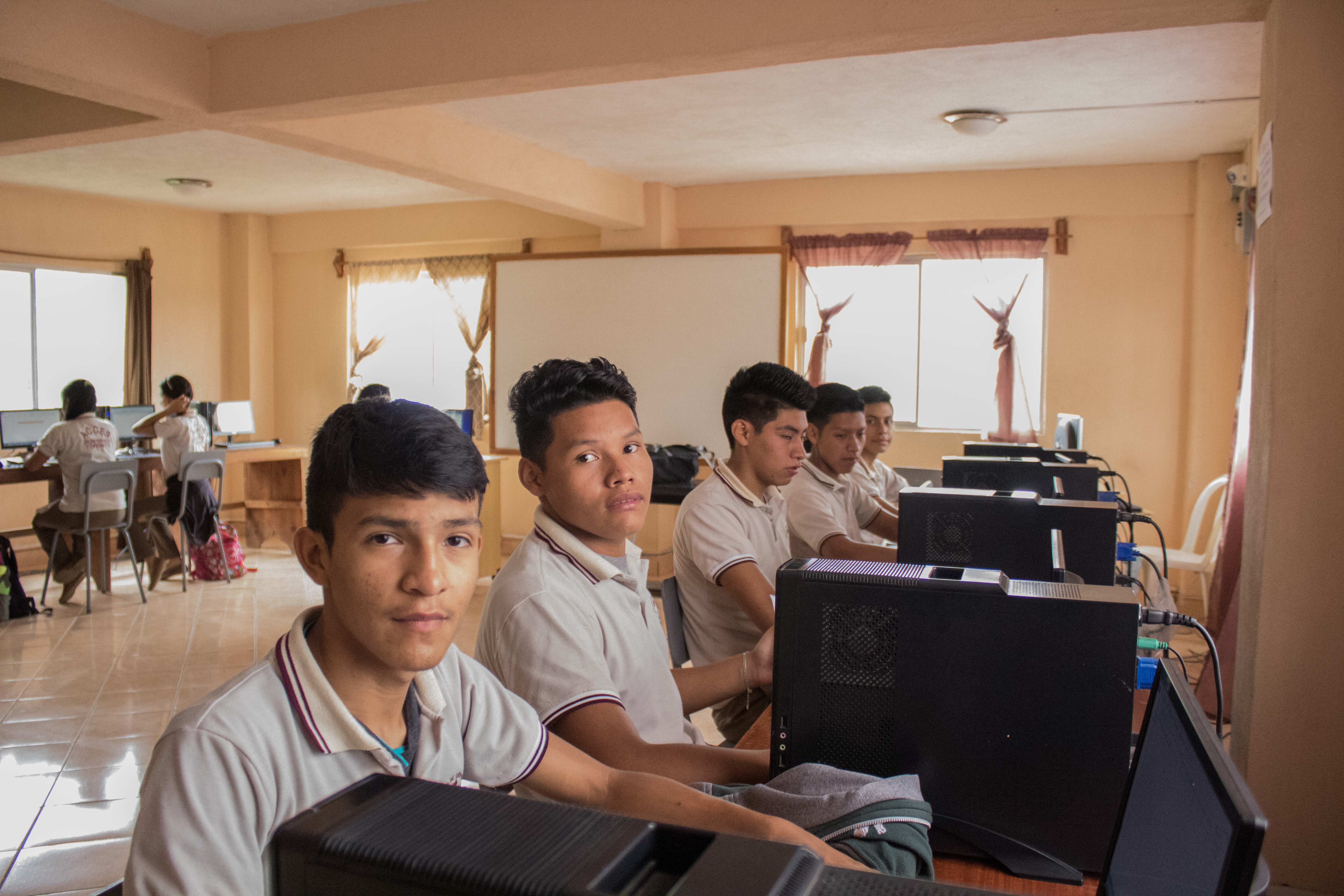 male students on computer
