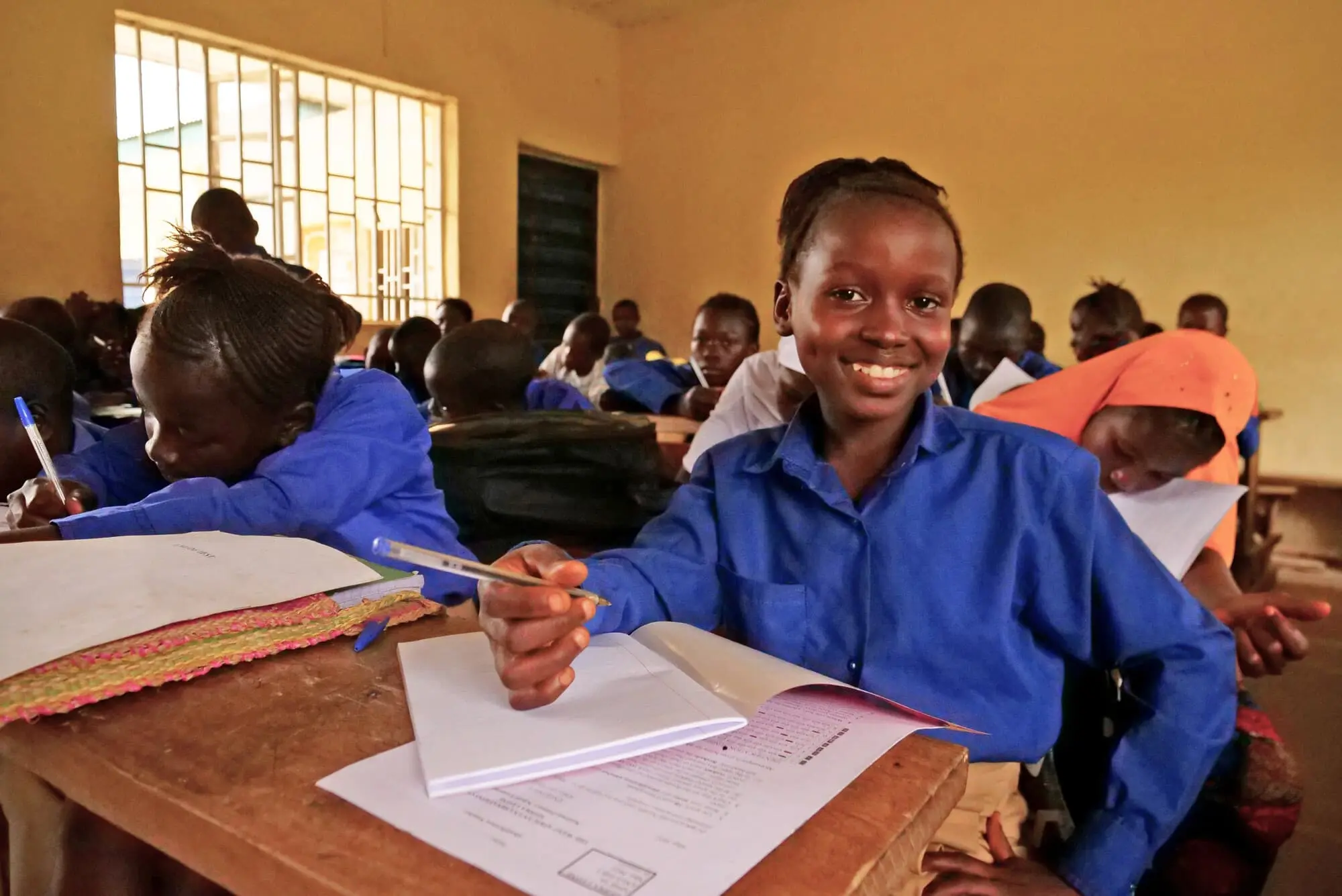 A young student during a school lesson in Masakong, Sierra Leone