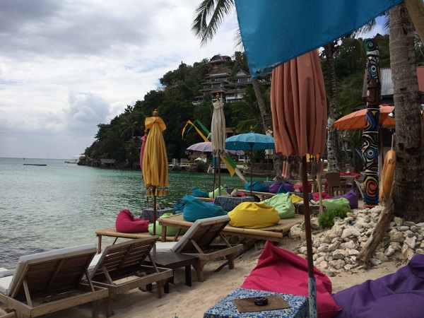 A lounge area by the coast of the ocean