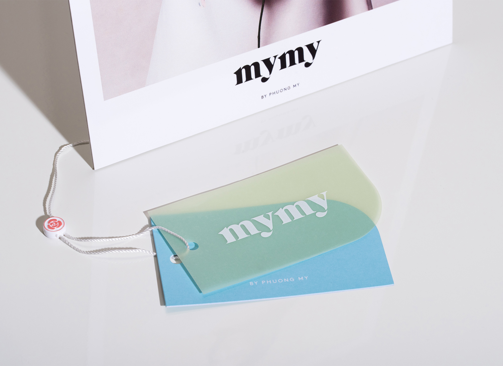 MYMY logo on swing tags for products