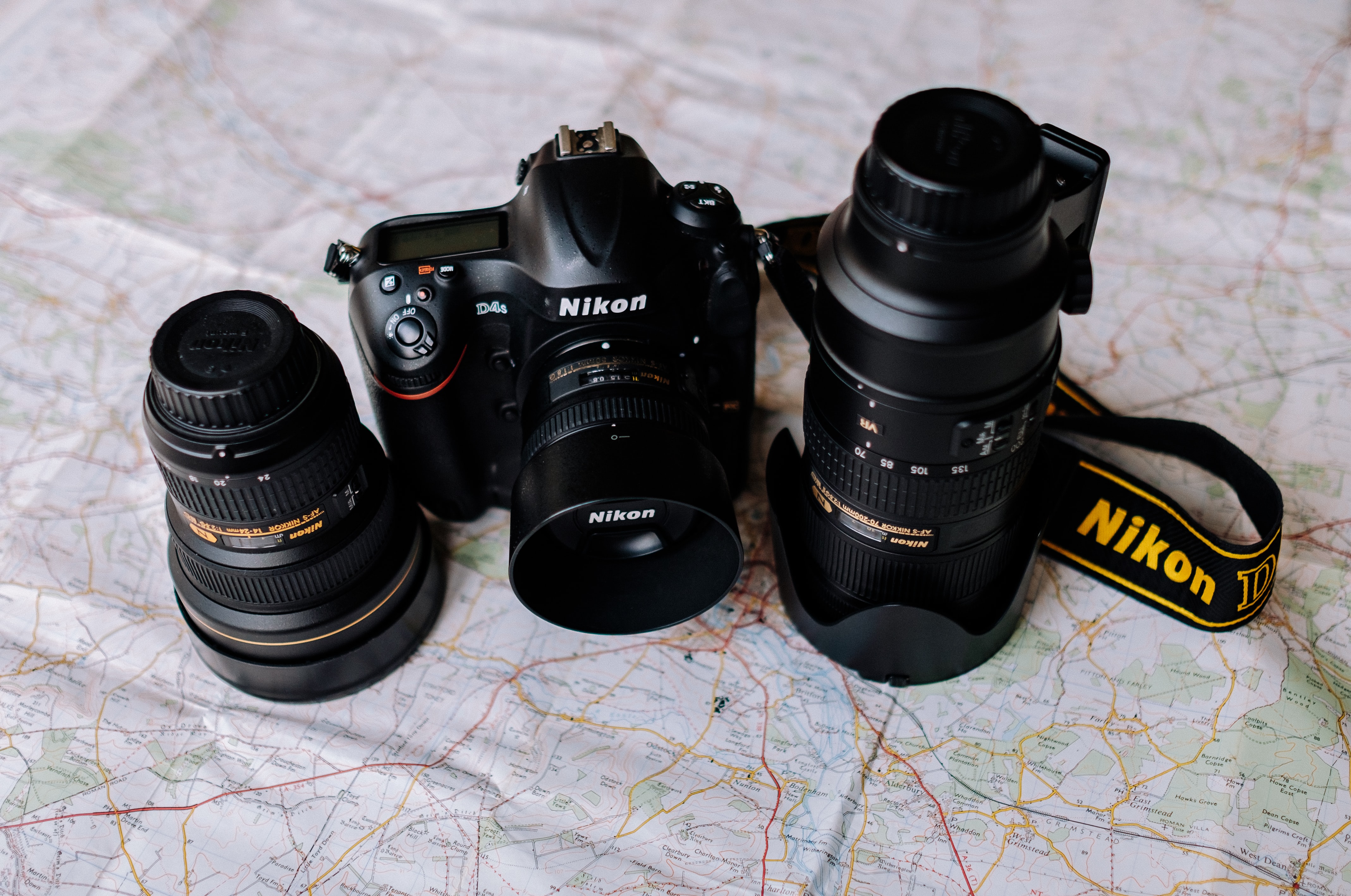 Nikon camera and lens on a map
