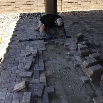 pavers being installed
