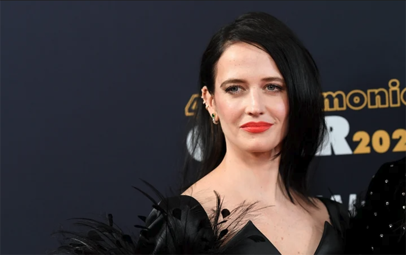 photo of eva green wearing a black dress and red lipstick