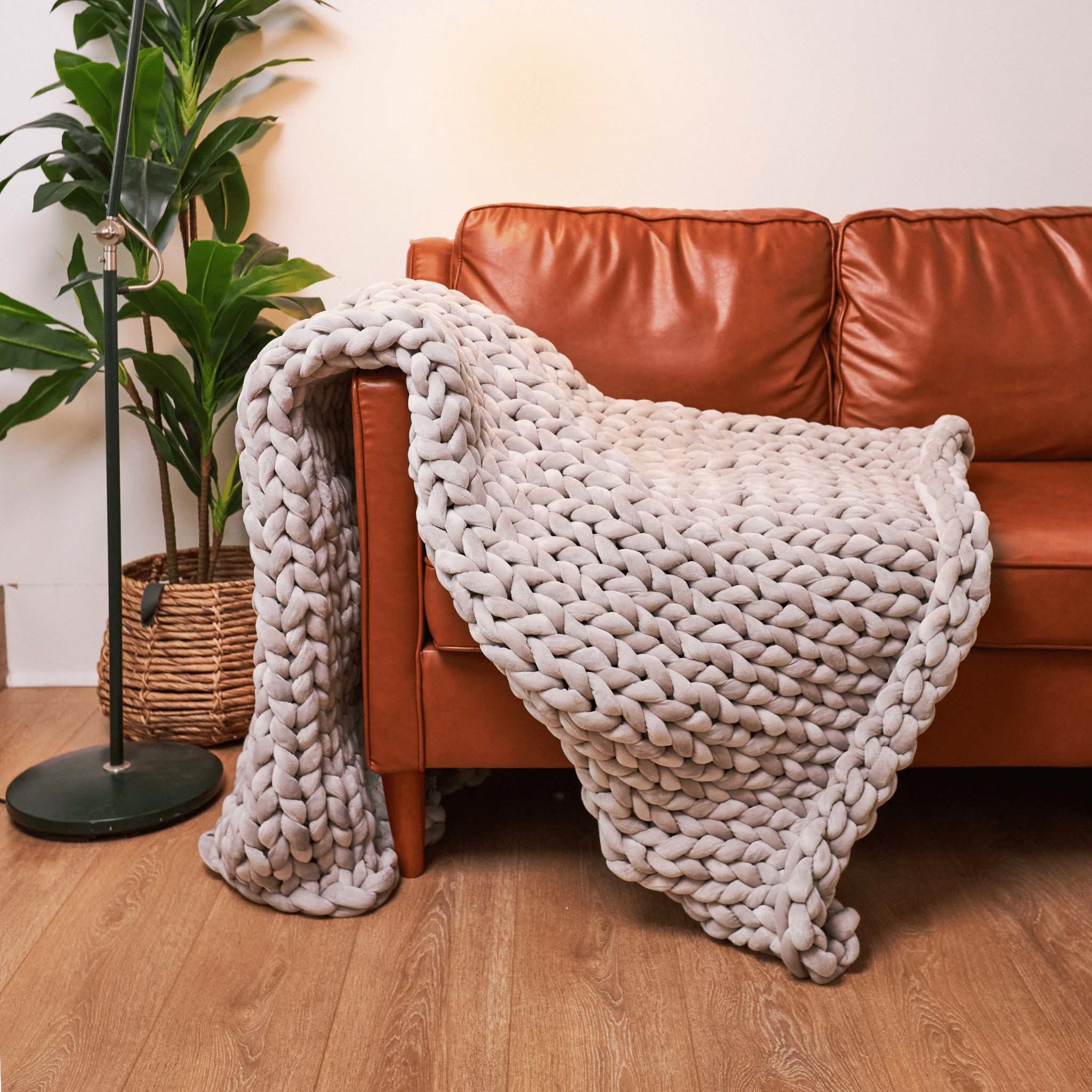 hush weighted blanket on sofa