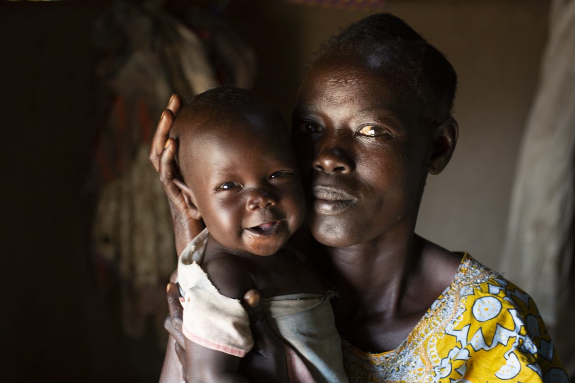 South Sudanese woman and young child