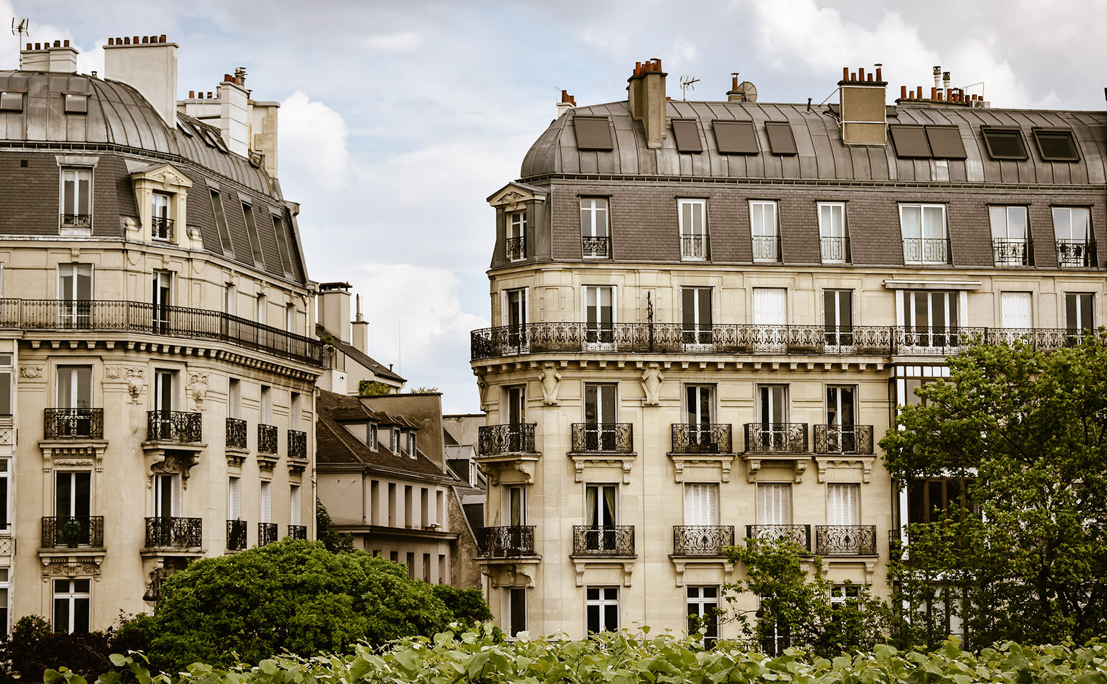 white stone apartment buildings in paris