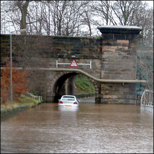 Car Stuck in Flood Waters
