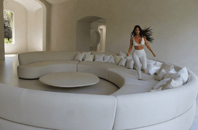 Kim Kardashian's gargantuan sofa, with herself for scale. © Kim Kardashian