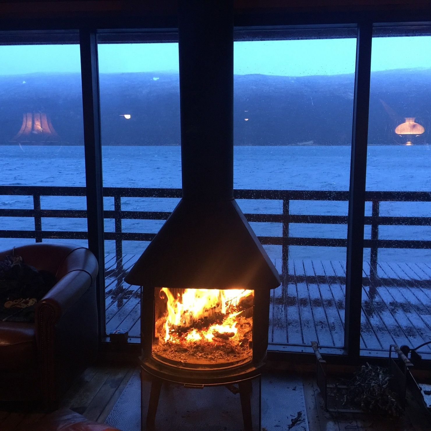 Very cosy: The wood stove and view of lake Skorradalsvatn