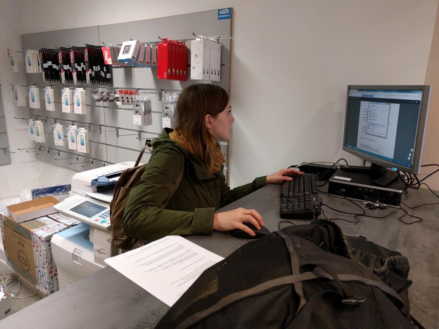 Bonus : Noemie fixing the printer in a cybercafé (aka The Printern)