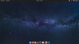 Screenshot of my desktop. It shows the upper bar and the dock on the bottom of the page. There's no icons on the desktop.