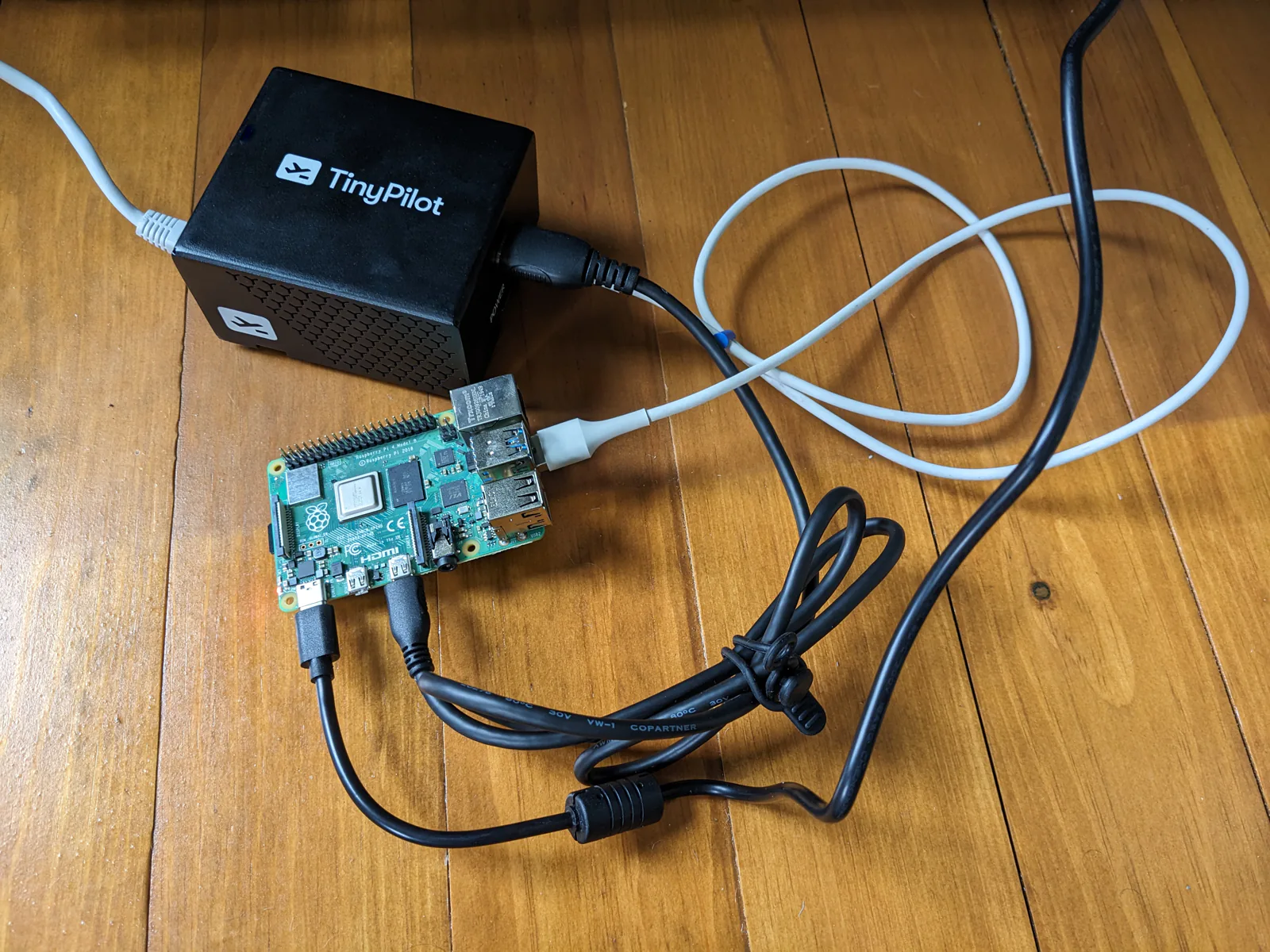 Photo of TinyPilot connected to a Raspberry Pi 4