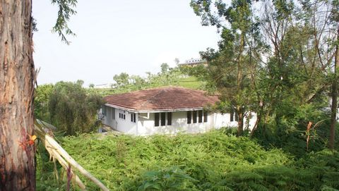 Neighbour house as seem from the plot