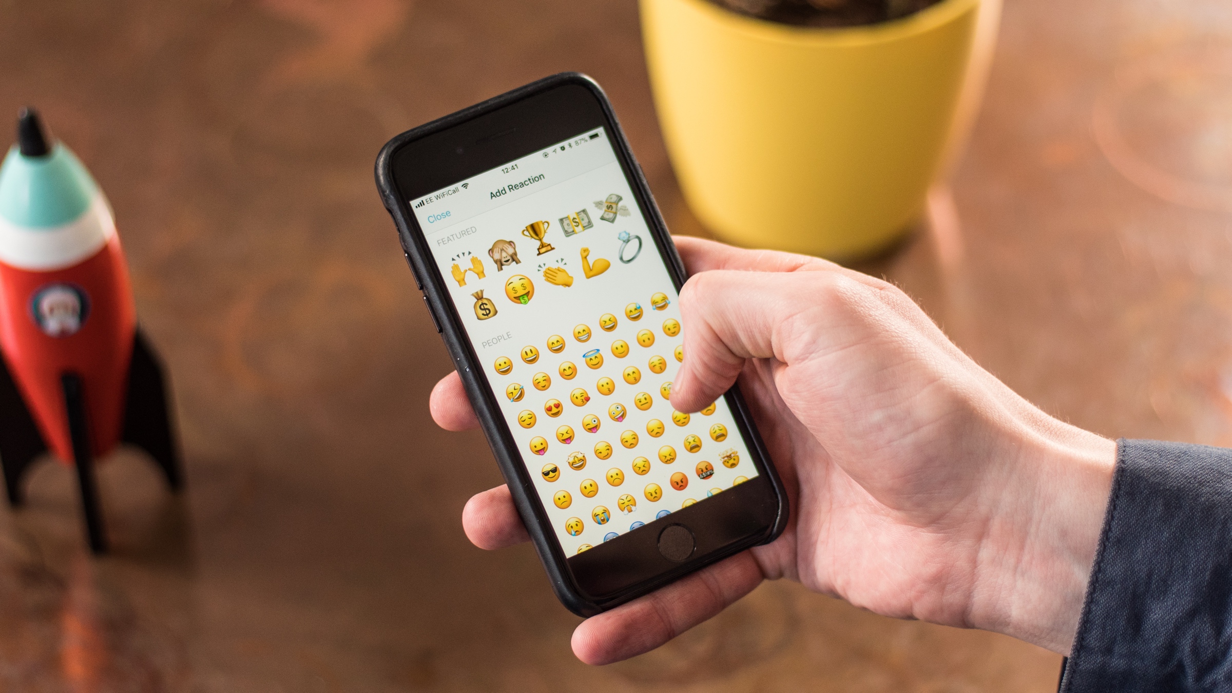 Screen showing how to pick an emoji to use to react to a payment