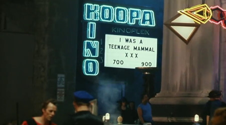 A shot from the Super Mario Bros. movie, showing one of the many jokes for adults A shot from the Super Mario Bros. movie, showing one of the many jokes for adults