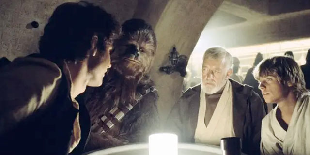 Han Solo, Chewbacca, Luke Skywalker and Obi Wan Kenobi ready to order a round of drinks at Mos Eisley Cantina