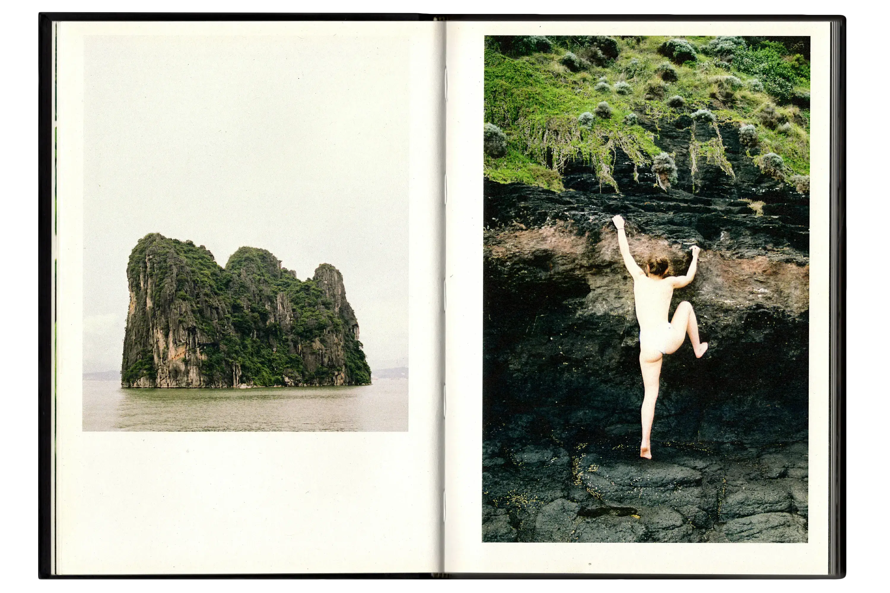 Imperfect Photo Book - left page shows a rock covered in vegetation standing out of the ocean, right page shows woman climbing rock