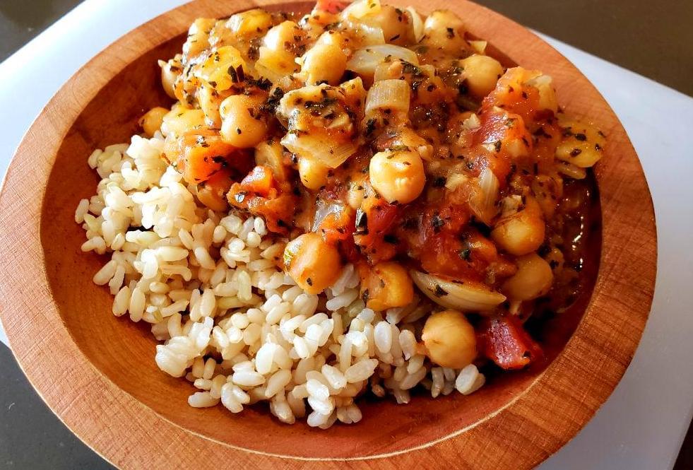 Bowl of coconut chickpea curry over rice
