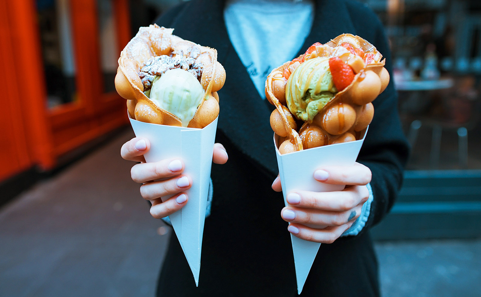 two waffle cones filled with ice cream
