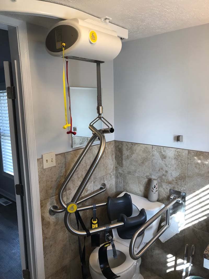 overhead lift leading to the newly installed accessible toilet