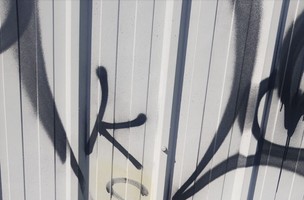 Graffiti on metal cladding