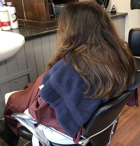 Sharon, a client getting their hair styled in Hair by Julie, the longest established hairdressers in Dufftown, Moray