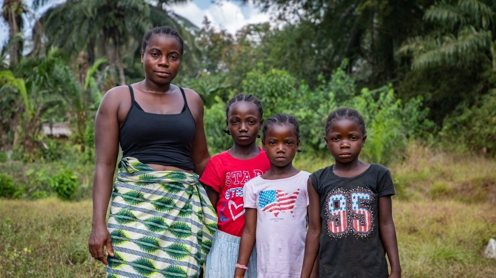 Liberian mother Sadah Smith and her three daughters, Darling Girl, Praise, and Praises