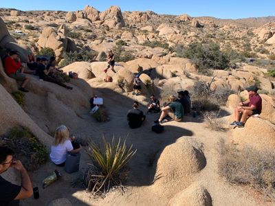 Chromatic team eating picnic lunch in Joshua Tree park