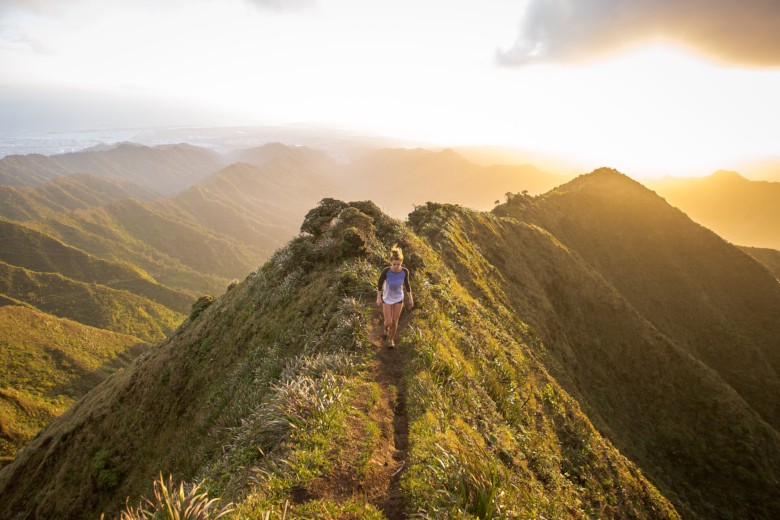 Running on Haiku Stairs maintain trail at sunset