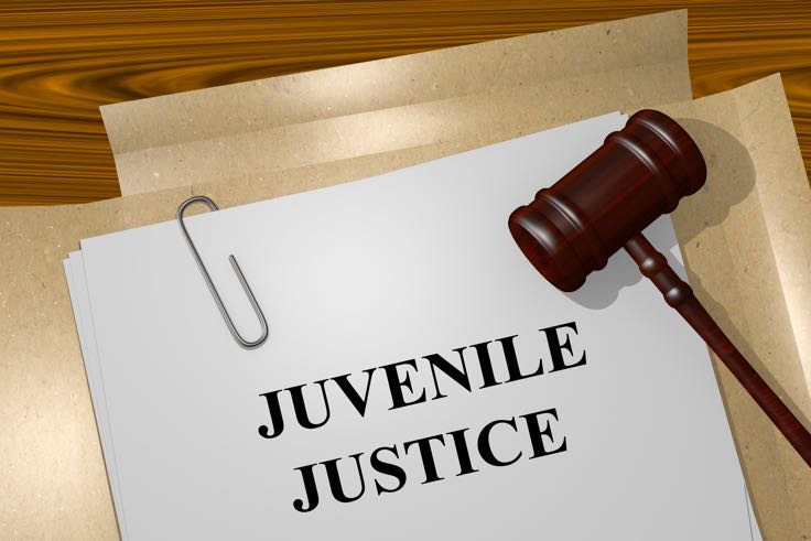 Juvenile justice legal paperwork with gavel