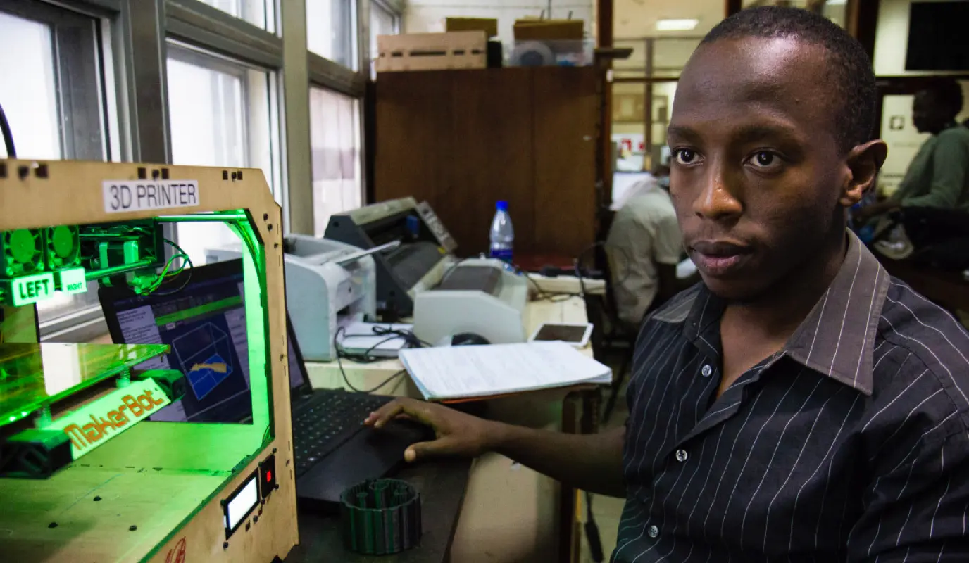 An engineering student at The University of Nairobi prototyping medical devices at a college lab in Kenya