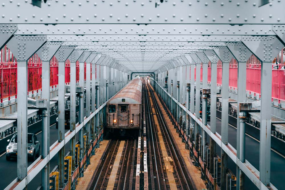 New York train tracks contrast silver and red