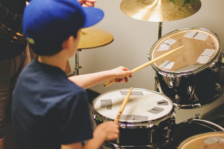 Student playing drums