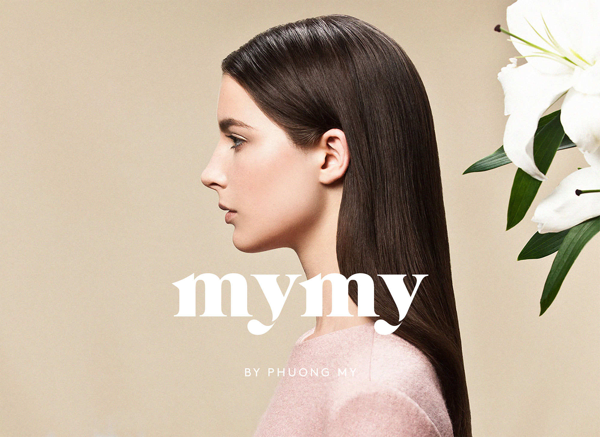 MYMY logo in front of girl with brown hair on a pink background