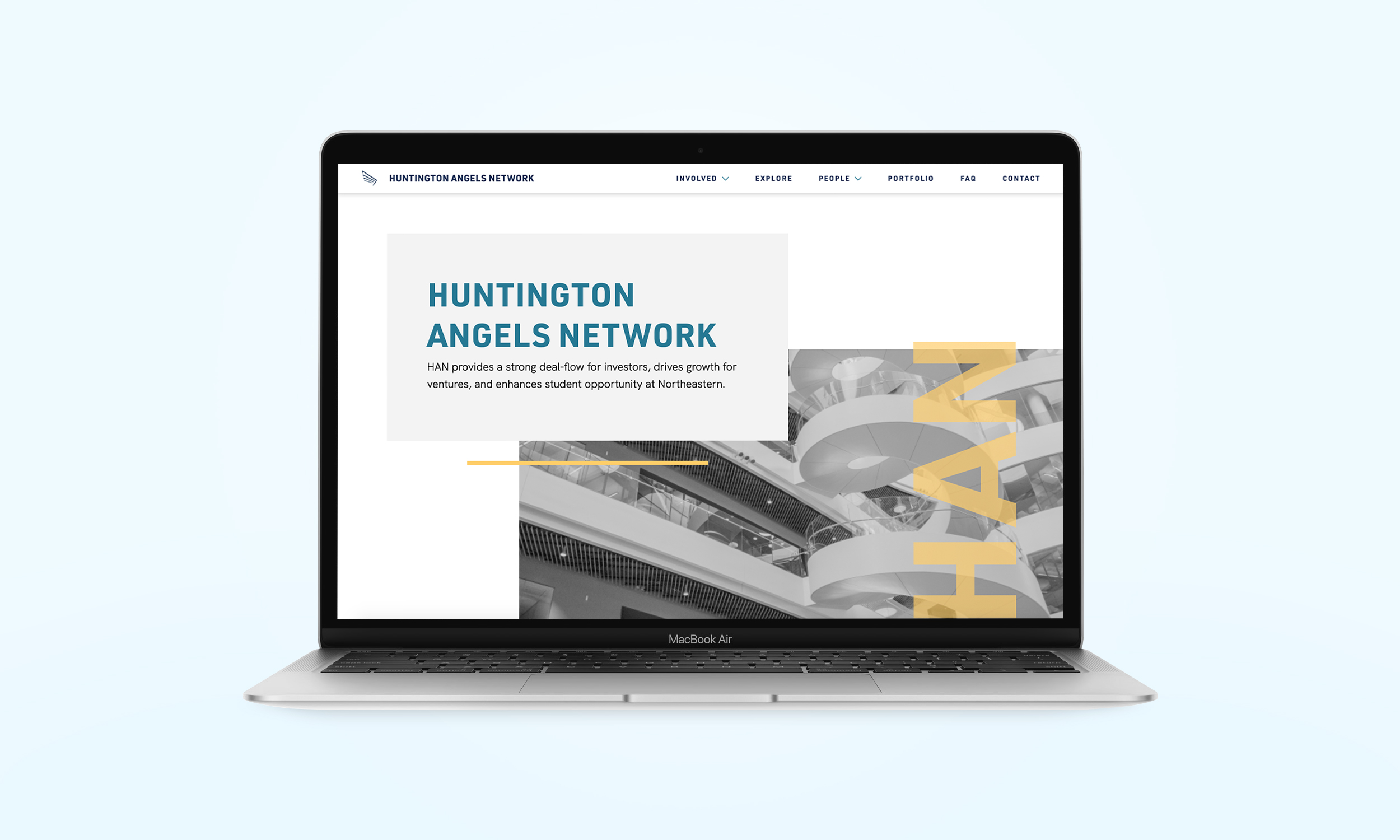a laptop screen open to the Huntington Angels Network website.