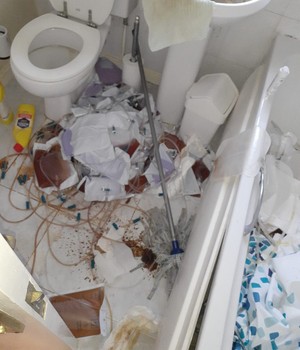 bathroom contaminated with clinical waste