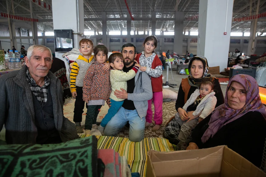 Family in a communal shelter after the 2023 Turkey earthquake
