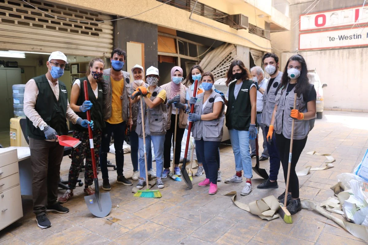 Members of Concern Lebanon volunteering with clean-up efforts in Beirut.