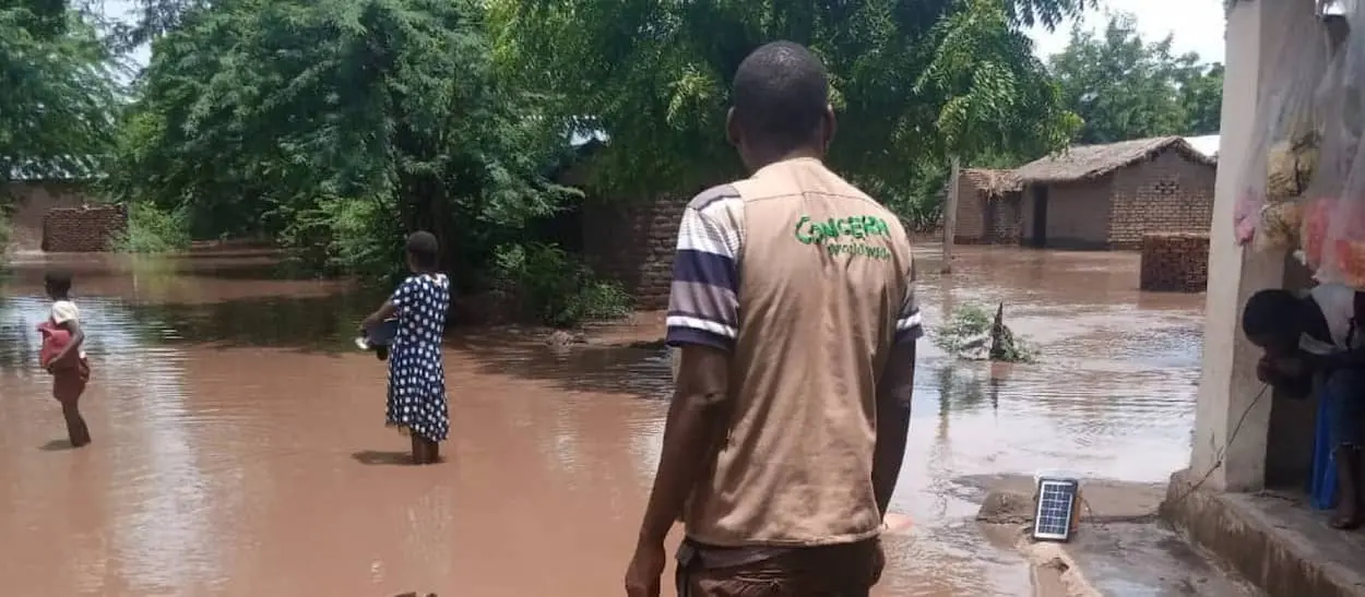 Concern Program Manager Tommy Chimpanzi leading a team to assess the damage done by flood waters in Nsanje district of southern Malawi.