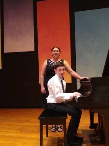michelle with student at piano