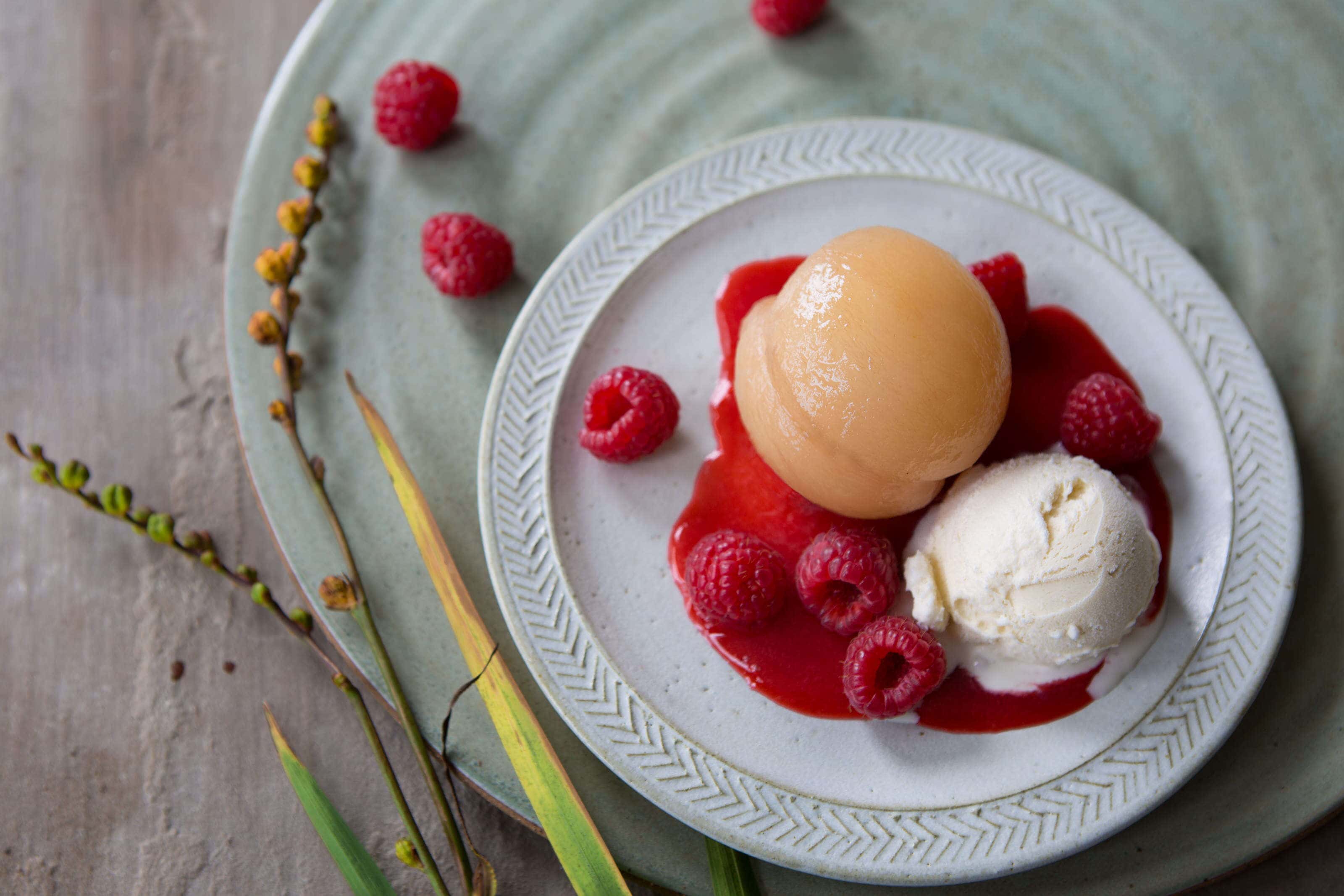 poache whole nectorine with raspberry coulis and ice cream.